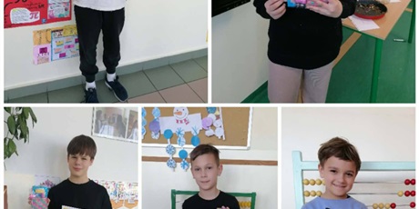 Powiększ grafikę: Uczniowie z nagrodami w konkursie  wypieków.